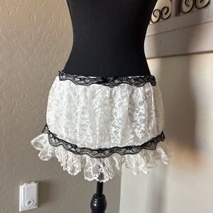 Pieces Of Porcelain Lace White Mini Skirt with Black Trim